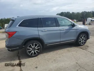 2022 Honda Pilot Touring 7-Passenger z VIN 5FNYF5H69NB031540, wystawiony jako Copart lot #51661185 z przebiegiem 58 316 mil mil oraz Szkoda całkowita • Salvage title. Historia ofert i sprzedaży dostępna na DreamBid. Obrazek 3.