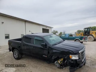 2021 GMC Canyon 4WD AT4 z VIN 1GTG6FEN9M1192443, wystawiony jako Copart lot #54955745 z przebiegiem 1544 mil mil oraz Tytuł czysty. Historia ofert i sprzedaży dostępna na DreamBid. Obrazek 4.
