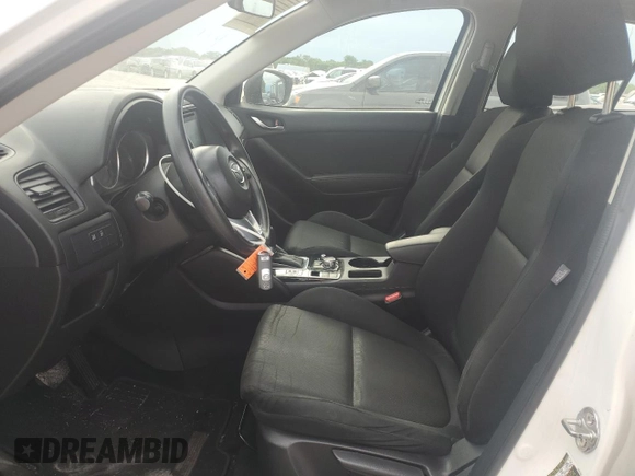 2016 Mazda CX-5 Sport with VIN JM3KE2BY0G0729349, listed as a Copart auction lot 62469735 with 88,247 mi miles and Salvage title. Bid and sale history available at DreamBid. Image 7.
