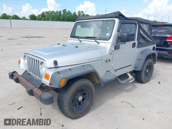 2005 Jeep Wrangler X with VIN 1J4FA39S75P321815, listed as a IAAI auction lot 42736150 with 141,914 mi miles and . Bid and sale history available at DreamBid. Image 2.