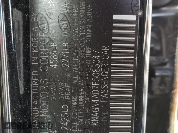 2015 Kia Optima EX z VIN KNAGN4AD7F5085047, wystawiony jako Copart lot #49511675 z przebiegiem Nie podano mil oraz Szkoda całkowita • Salvage title. Historia ofert i sprzedaży dostępna na DreamBid. Obrazek 12.