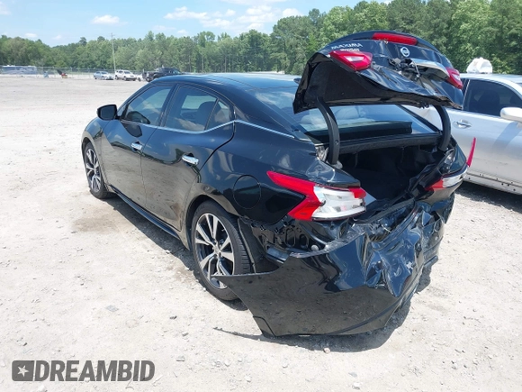 2016 Nissan Maxima Platinum with VIN 1N4AA6AP1GC901425, listed as a IAAI auction lot 42526689 with 118,804 mi miles and . Bid and sale history available at DreamBid. Image 3.