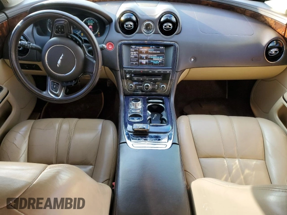 2013 Jaguar XJ with VIN SAJWJ1CD6D8V50968, listed as a Copart auction lot 79880924 with 136,280 mi miles and Salvage Title. Bid and sale history available at carsss.com. Image 8.