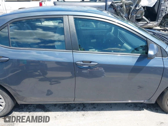 2018 Toyota Corolla L with VIN 5YFBURHE1JP832911, listed as a IAAI auction lot 42237901 with 92,158 mi miles and . Bid and sale history available at DreamBid. Image 13.