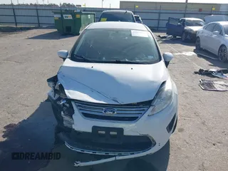 2012 Ford Fiesta SE with VIN 3FADP4BJ0CM207764, listed as a IAAI auction lot 41852699 with 143,287 mi miles. Bid and sale history available at carsss.com. Image 12.