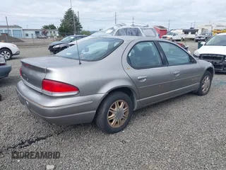 1998 Chrysler Cirrus LXi z VIN 1C3EJ56H0WN300229, wystawiony jako IAAI lot #42251263 z przebiegiem 191 491 mil mil oraz . Historia ofert i sprzedaży dostępna na DreamBid. Obrazek 4.