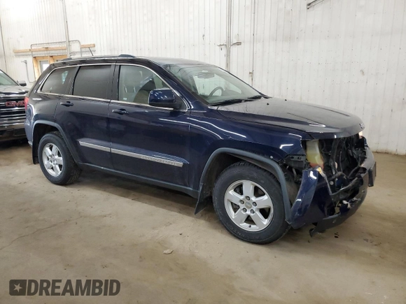 2012 Jeep Grand Cherokee Laredo with VIN 1C4RJFAG9CC221229, listed as a Copart auction lot 52035545 with 70,332 mi miles and Salvage Title. Bid and sale history available at carsss.com. Image 4.