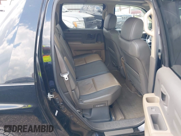 2006 Honda Ridgeline RTL with VIN 2HJYK165X6H558475, listed as a IAAI auction lot 42555097 with 180,711 mi miles and . Bid and sale history available at DreamBid. Image 8.