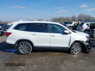 2021 Honda Pilot EX-L with VIN 5FNYF5H57MB037861, listed as a IAAI auction lot 41566924 with 42,867 mi miles. Bid and sale history available at carsss.com. Image 13.