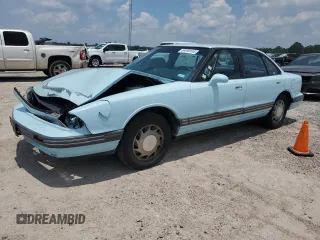 1992 Oldsmobile 88 z VIN 1G3HN53L4NH348979, wystawiony jako Copart lot #59209184 z przebiegiem 144 820 mil mil oraz Szkody całkowita. Historia ofert i sprzedaży dostępna na DreamBid. Obrazek 1.