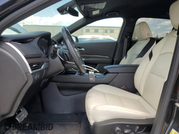 2021 Cadillac XT4 AWD Sport with VIN 1GYFZFR43MF054379, listed as a Copart auction lot 55338315 with 53,693 mi miles and Salvage title. Bid and sale history available at DreamBid. Image 7.