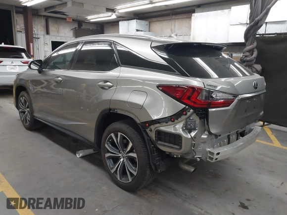 2022 Lexus RX 350 with VIN 2T2HZMAA6NC232022, listed as a IAAI auction lot 42528304 with 22,576 mi miles and . Bid and sale history available at DreamBid. Image 3.