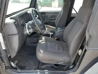 2004 Jeep Wrangler SE with VIN 1J4FA29124P796031, listed as a Copart auction lot 56875525 with 239,488 mi miles and Clean title. Bid and sale history available at DreamBid. Image 7.
