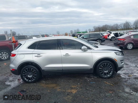 2015 Lincoln MKC z VIN 5LMCJ1A95FUJ20349, wystawiony jako IAAI lot #41695129 z przebiegiem 140 878 mil mil oraz . Historia ofert i sprzedaży dostępna na DreamBid. Obrazek 13.