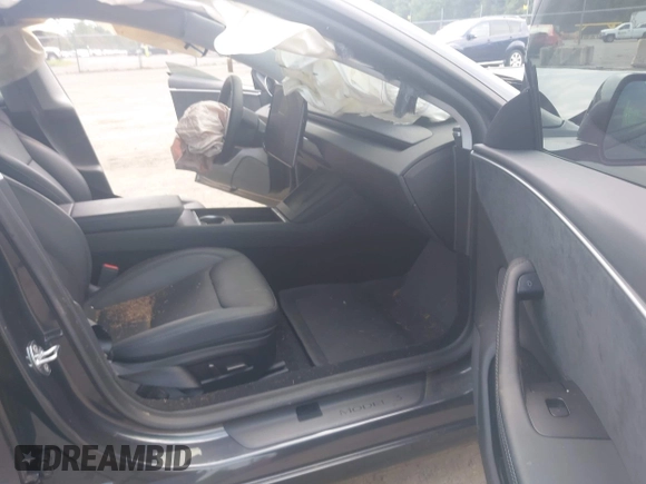 2025 Tesla Model 3 Long Range with VIN 5YJ3E1EB2SF899446, listed as a IAAI auction lot 42478353 with Not provided miles and . Bid and sale history available at DreamBid. Image 5.