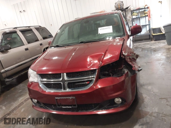 2019 Dodge Grand Caravan SXT with VIN 2C4RDGCG9KR678235, listed as a IAAI auction lot 41864931 with 127,848 mi miles and . Bid and sale history available at DreamBid. Image 12.