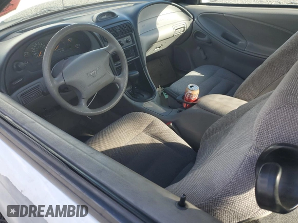 1997 Ford Mustang with VIN 1FALP4042VF119326, listed as a Copart auction lot 69286674 with 120,842 mi miles and Salvage Title. Bid and sale history available at carsss.com. Image 8.