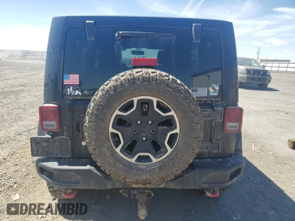2014 Jeep Wrangler Unlimited Rubicon с VIN 1C4BJWFG7EL119344, выставлен на аукционе Copart как лот 65652265 с пробегом 150 934 миль миль и Списание • Salvage title. История ставок и продаж доступна на DreamBid. Изображение 6.