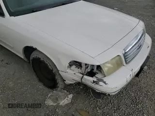 1998 Ford Crown Victoria Police z VIN 2FAFP71W7WX124185, wystawiony jako Copart lot #66187024 z przebiegiem 161 325 mil mil oraz Szkody całkowita. Historia ofert i sprzedaży dostępna na DreamBid. Obrazek 13.