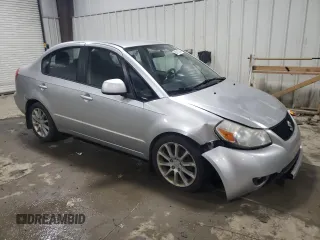 2011 Suzuki SX4 LE with VIN JS2YC5A21B6300076, listed as a Copart auction lot 83118734 with 213,177 mi miles and Salvage Title. Bid and sale history available at carsss.com. Image 4.