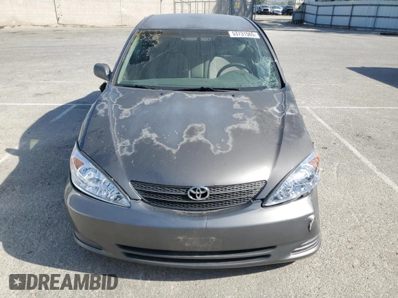 2004 Toyota Camry LE z VIN 4T1BE32K34U881717, wystawiony jako Copart lot #53731565 z przebiegiem Nie podano mil oraz Szkoda całkowita • Salvage title. Historia ofert i sprzedaży dostępna na DreamBid. Obrazek 5.