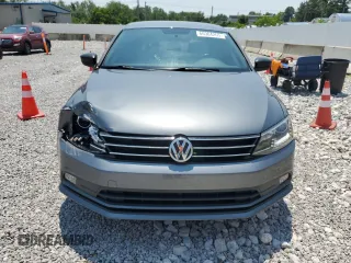 2015 Volkswagen Jetta SE with VIN 3VWD17AJ2FM323094, listed as a Copart auction lot 60304265 with 115,540 mi miles and Salvage title. Bid and sale history available at DreamBid. Image 5.