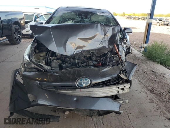 2016 Toyota Prius Four z VIN JTDKARFU0G3516517, wystawiony jako Copart lot #54998275 z przebiegiem Nie podano mil oraz Szkoda całkowita • Salvage title. Historia ofert i sprzedaży dostępna na DreamBid. Obrazek 5.