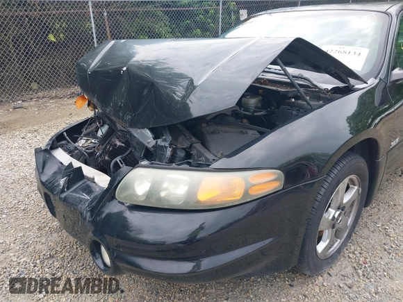 2002 Pontiac Bonneville SLE z VIN 1G2HY54KX24177224, wystawiony jako IAAI lot #42268134 z przebiegiem 107 935 mil mil oraz . Historia ofert i sprzedaży dostępna na DreamBid. Obrazek 6.