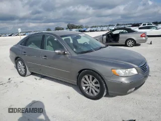 2009 Hyundai Azera Limited z VIN KMHFC46FX9A373084, wystawiony jako Copart lot #45532865 z przebiegiem 107 592 mil mil oraz Szkoda całkowita • Salvage title. Historia ofert i sprzedaży dostępna na DreamBid. Obrazek 4.