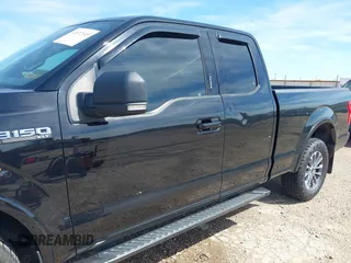 2018 Ford F-150 XL with VIN 1FTEX1EP7JFC21008, listed as a IAAI auction lot 42072145 with 102,679 mi miles and . Bid and sale history available at DreamBid. Image 6.