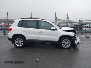 2015 Volkswagen Tiguan SE z VIN WVGBV7AX5FW584833, wystawiony jako IAAI lot #41855476 z przebiegiem 123 299 mil mil oraz . Historia ofert i sprzedaży dostępna na DreamBid. Obrazek 13.