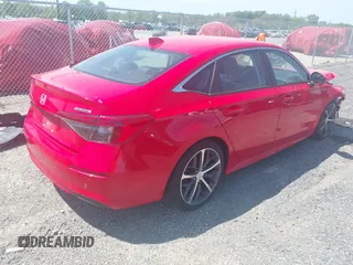 2024 Honda Civic Touring with VIN 2HGFE1F97RH302435, listed as a IAAI auction lot 42155203 with 23,494 mi miles and . Bid and sale history available at DreamBid. Image 4.