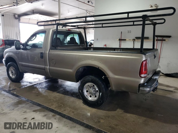 2004 Ford F-250 XL with VIN 1FTNF21L74EA64859, listed as a Copart auction lot 60397875 with 268,149 mi miles and Salvage title. Bid and sale history available at DreamBid. Image 2.