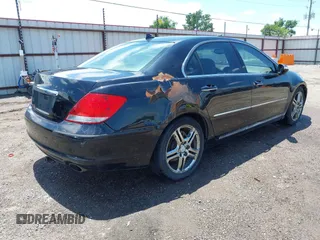 2005 Acura RL z VIN JH4KB16505C001925, wystawiony jako IAAI lot #42435200 z przebiegiem 154 217 mil mil oraz . Historia ofert i sprzedaży dostępna na DreamBid. Obrazek 4.