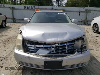 2009 Cadillac DTS 1SA z VIN 1G6KD57Y69U114700, wystawiony jako Copart lot #56007485 z przebiegiem 158 849 mil mil oraz Szkody całkowita. Historia ofert i sprzedaży dostępna na DreamBid. Obrazek 5.