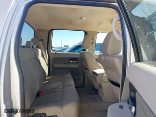 2007 Ford F-150 XLT with VIN 1FTRW12W67KC87730, listed as a IAAI auction lot 41657957 with 142,982 mi miles. Bid and sale history available at carsss.com. Image 8.