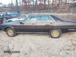 1982 Maserati Quattroporte z VIN ZAMBC1102CA301920, wystawiony jako IAAI lot #41297603 z przebiegiem 62 287 mil mil oraz . Historia ofert i sprzedaży dostępna na DreamBid. Obrazek 14.