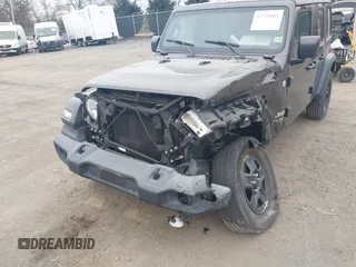 2019 Jeep Wrangler Unlimited Sport Altitude with VIN 1C4HJXDG0KW559807, listed as a IAAI auction lot 41790082 with 34,221 mi miles and . Bid and sale history available at DreamBid. Image 6.