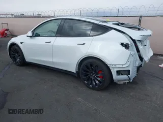 2023 Tesla Model Y Performance with VIN 7SAYGDEFXPF589477, listed as a IAAI auction lot 41936981 with 28,993 mi miles and . Bid and sale history available at DreamBid. Image 3.