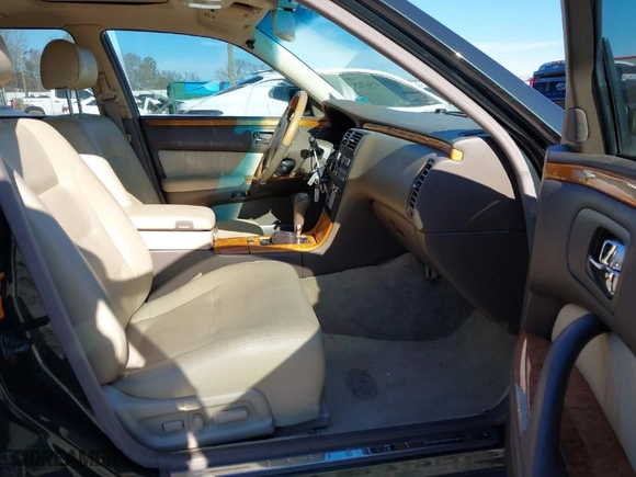 2000 Infiniti Q45 with VIN JNKBY31A7YM301457, listed as a IAAI auction lot 41583825 with 174,265 mi miles. Bid and sale history available at carsss.com. Image 5.