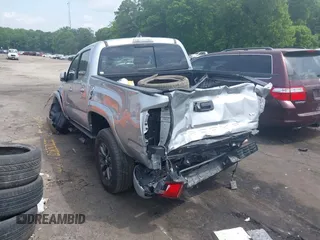2023 Toyota Tacoma SR with VIN 3TYCZ5AN2PT176554, listed as a IAAI auction lot 42148651 with 15,255 mi miles and . Bid and sale history available at DreamBid. Image 3.
