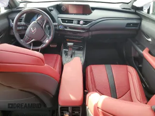 2021 Lexus UX with VIN JTHR9JBH2M2049747, listed as a Copart auction lot 43319555 with 22,606 mi miles and Salvage Title. Bid and sale history available at carsss.com. Image 8.