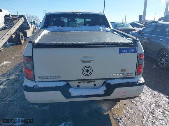 2013 Honda Ridgeline RTL with VIN 5FPYK1F54DB015461, listed as a IAAI auction lot 41601818 with 107,211 mi miles. Bid and sale history available at carsss.com. Image 16.