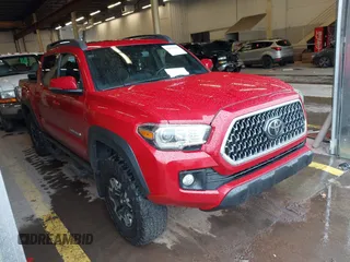 2019 Toyota Tacoma SR z VIN 3TMCZ5AN5KM220079, wystawiony jako IAAI lot #41856695 z przebiegiem 51 918 mil mil oraz . Historia ofert i sprzedaży dostępna na DreamBid. Obrazek 1.
