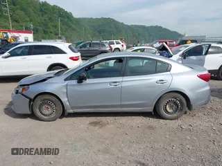 2017 Subaru Impreza z VIN 4S3GKAA62H3603771, wystawiony jako IAAI lot #42217635 z przebiegiem 118 903 mil mil oraz . Historia ofert i sprzedaży dostępna na DreamBid. Obrazek 14.