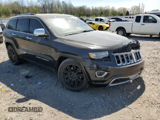 2015 Jeep Grand Cherokee Overland with VIN 1C4RJFCG3FC104439, listed as a Copart auction lot 50780295 with 196,549 mi miles and Salvage Title. Bid and sale history available at carsss.com. Image 4.