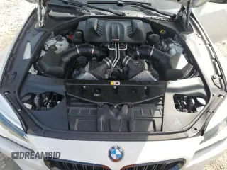 2017 BMW M6 z VIN WBS6G9C59HD932339, wystawiony jako Copart lot #76159614 z przebiegiem 81 987 mil mil oraz Nie do naprawy • Non repairable. Historia ofert i sprzedaży dostępna na DreamBid. Obrazek 11.
