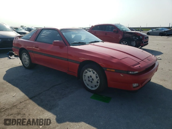 1988 Toyota Supra z VIN JT2MA71JXJ0094266, wystawiony jako Copart lot #59028715 z przebiegiem 133 654 mil mil oraz Czysty tytuł • Clean title. Historia ofert i sprzedaży dostępna na DreamBid. Obrazek 4.