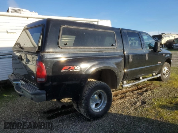 2003 Ford F-350 XL with VIN 1FTWW33P63EB35350, listed as a Copart auction lot 44865495 with 169,124 mi miles and Salvage Title. Bid and sale history available at DreamBid. Image 3.