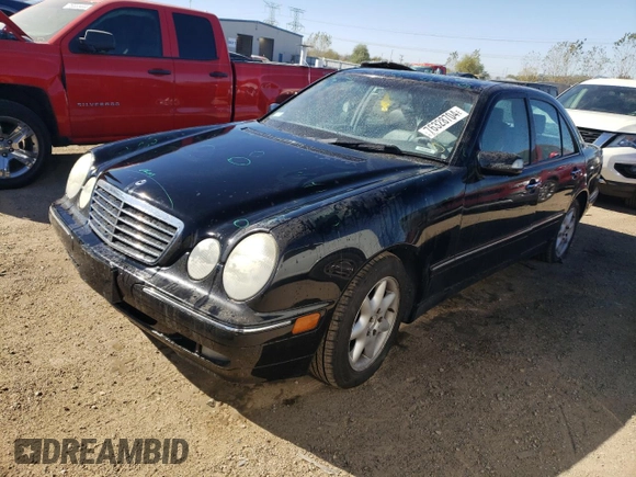 2001 Mercedes-Benz E-Class with VIN WDBJF65J01B325792, listed as a Copart auction lot 76328704 with 101,886 mi miles and Salvage Title. Bid and sale history available at carsss.com. Image 1.